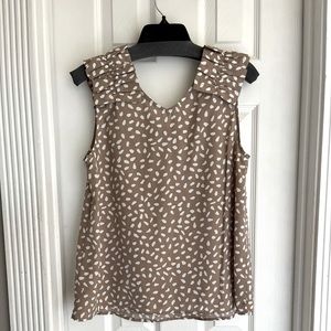 “Entro” brand blouse.